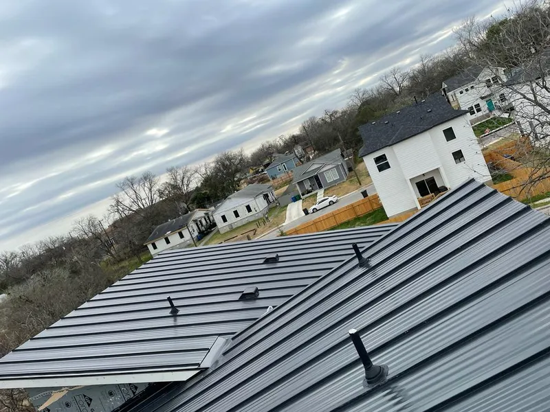 Standing seam metal roof panels with vents for Skylight Repair in Choctaw